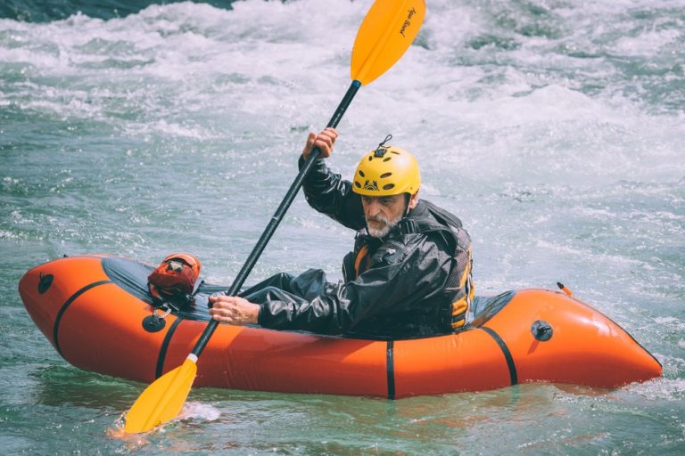 senior man kayaking in BRIS Inflatable Boat
