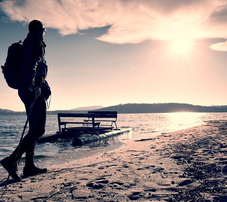 a portable inflatable pontoon on a beach with a man