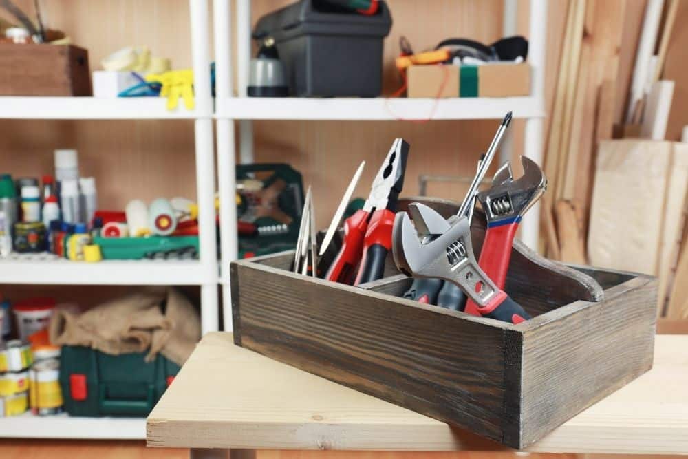 tools in wooden tool box