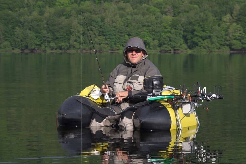 man fishing on a float tube