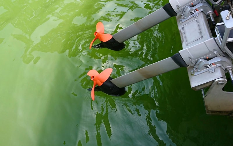 propellers of Torqeedo motors on the water surface