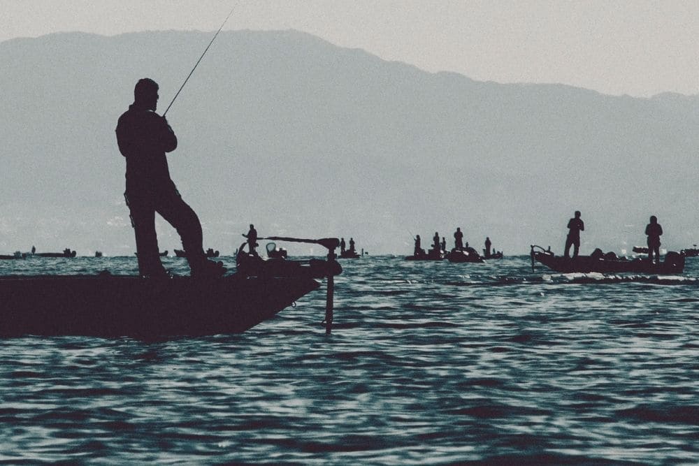 Fishing on a boat running by trolling motor