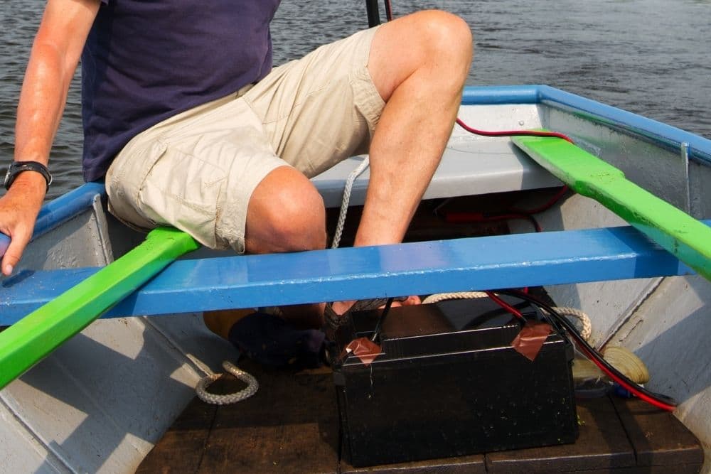 an old trolling motor battery on boat