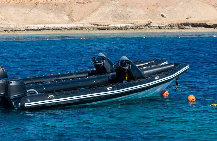 Two RIB boats with outboard motors