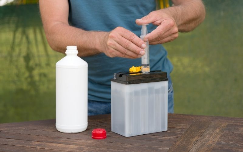 fill battery cells with distilled water