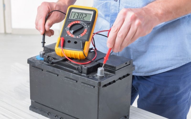 testing battery voltage with a voltmeter
