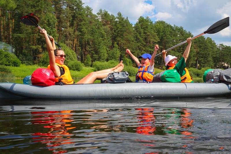 sitting in an inflatable kayak