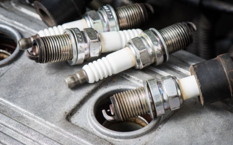 used spark plugs are removed out of the motor