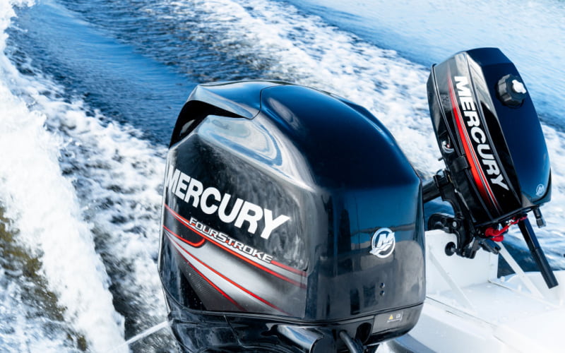 Mercury four-stroke outboard motor running on the water