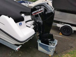 flush a Mercury outboard motor with a bucket