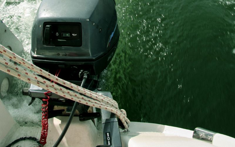 sailing smoothly with an onboard engine mounted on a boat